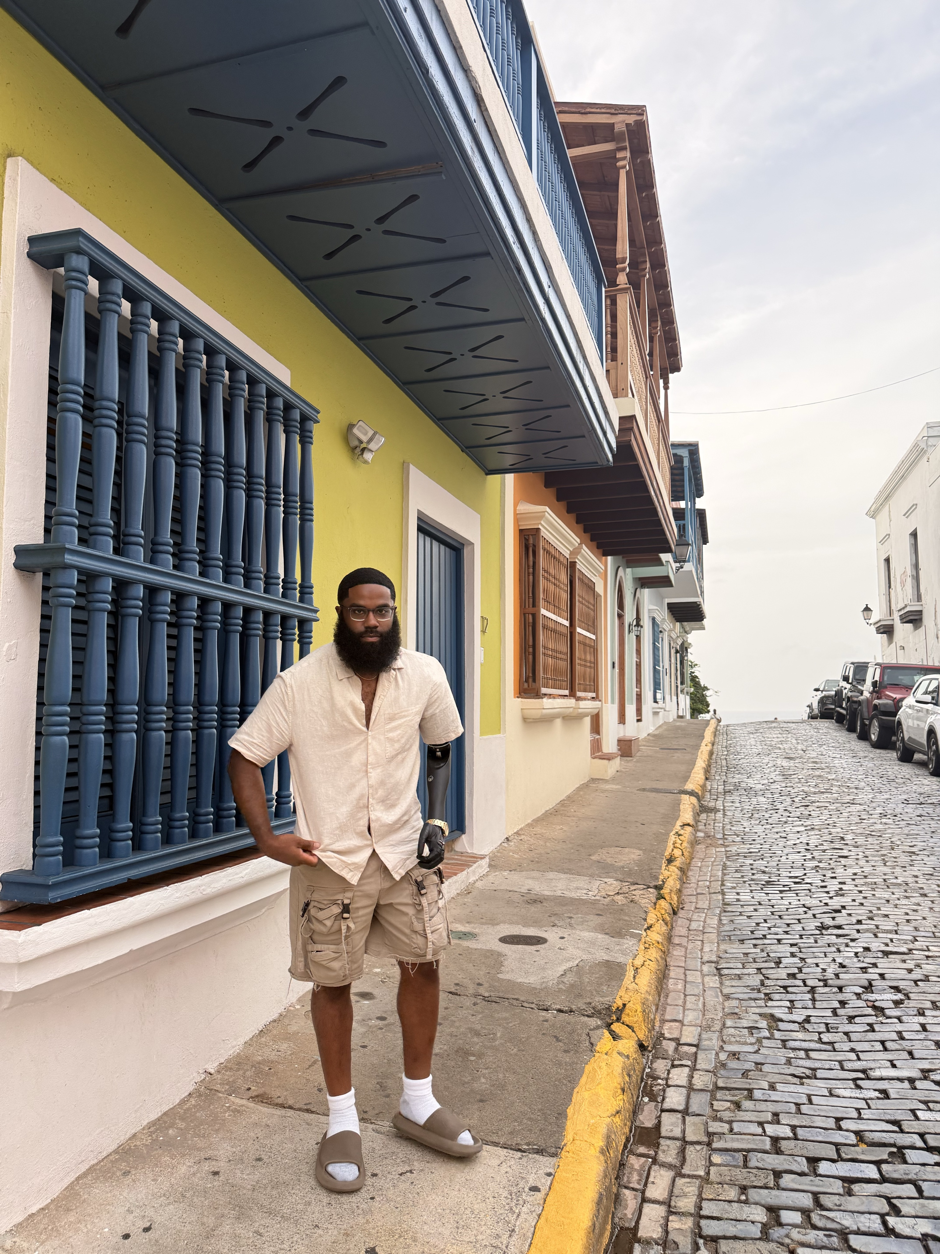 Jonathan Freeman standing on a street in Old San Juan, Puerto Rico